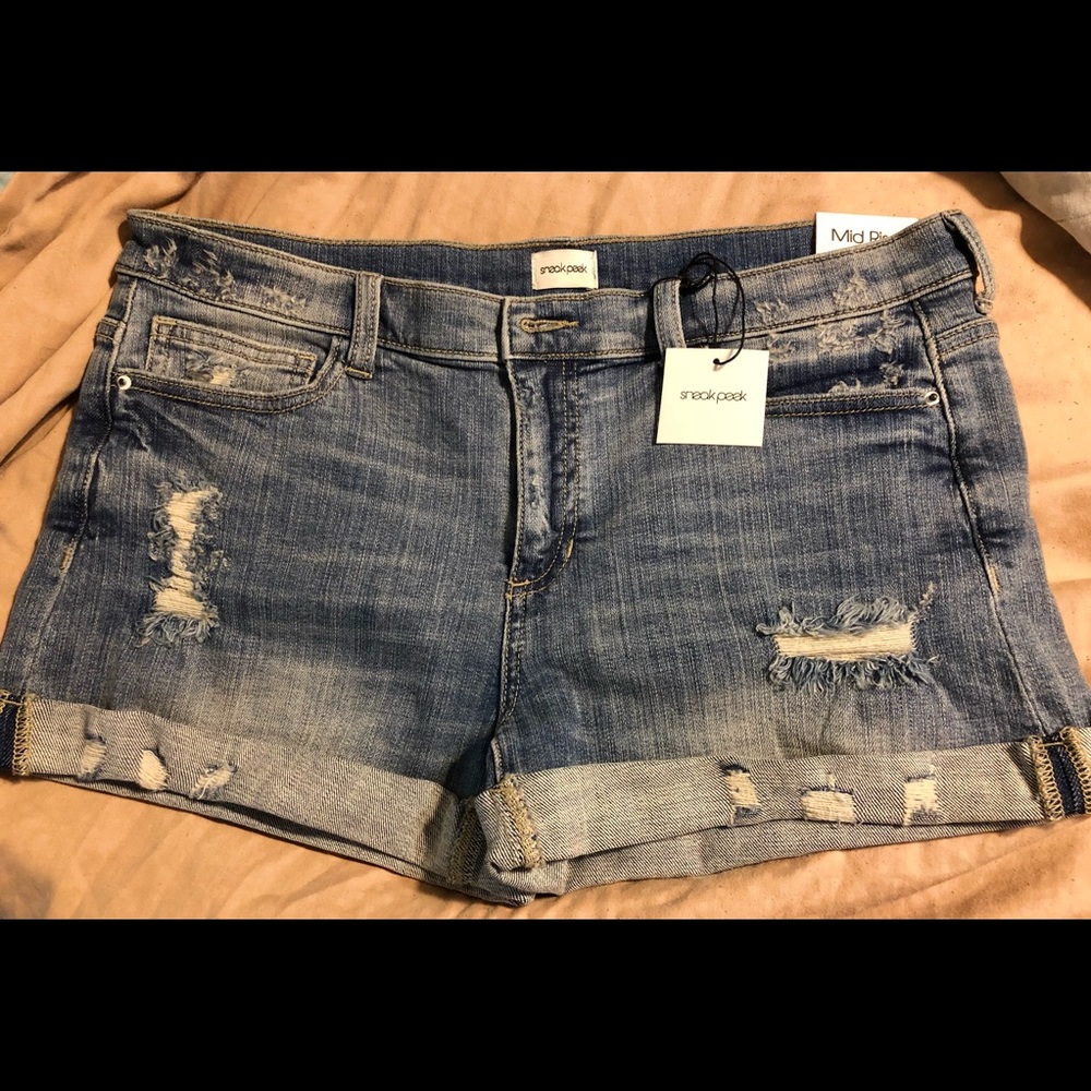 New pair Sneak Peek shorts. They do have stretch in waist.